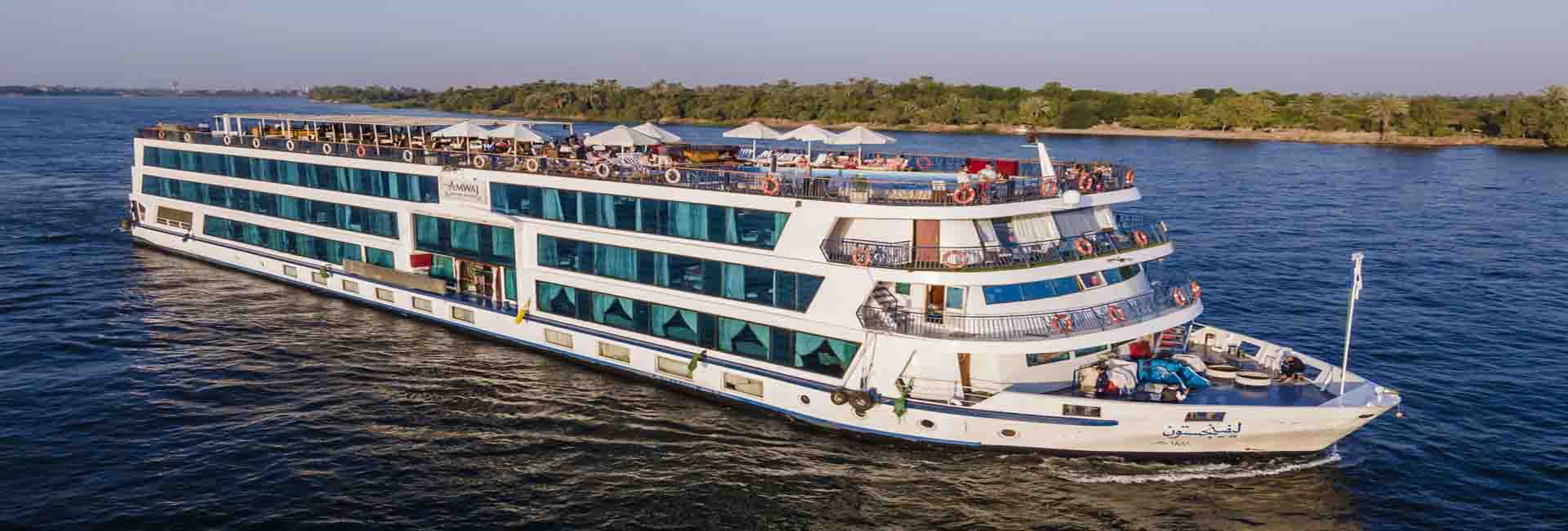 Nile cruise vessels moored along the Luxor Corniche